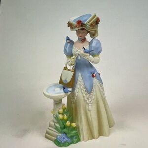 Avon President’s Club First Representative Porcelain Figurine. 10”  Excellent